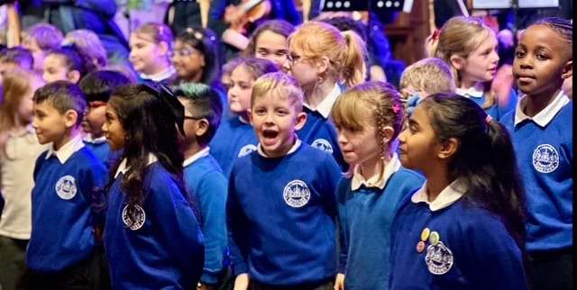 Inspirational Children from a School with 47 Spoken Languages Played Centre Stage in a Community Christmas Carol Service Hosted by a Lord Lieutenant