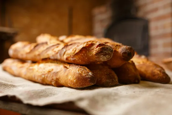 French bakers make world’s longest baguette give part  to homeless people
