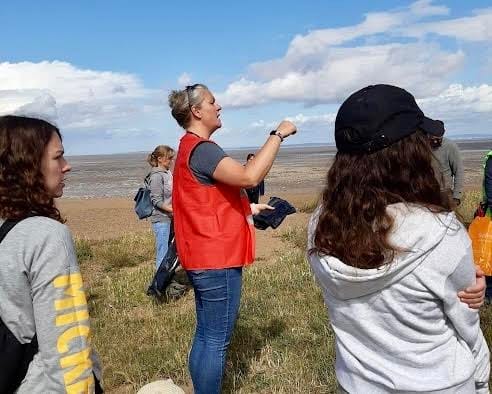 Superb school eco club thoroughly cleans up a beach